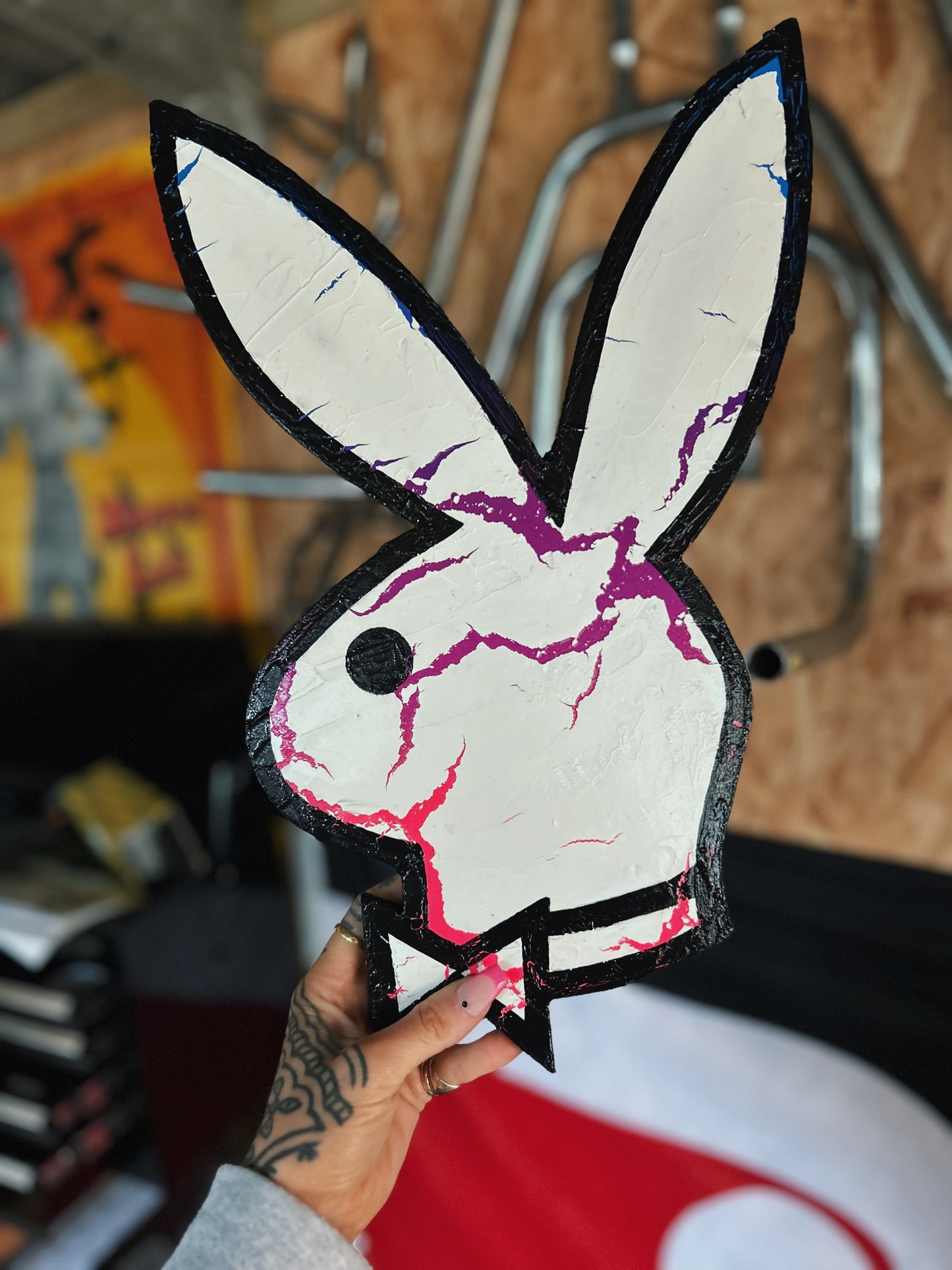 A SMALL NEON CRACKLED WOOD BUNNY